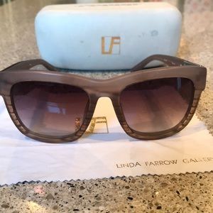 Great condition sunglasses in a mauve shade